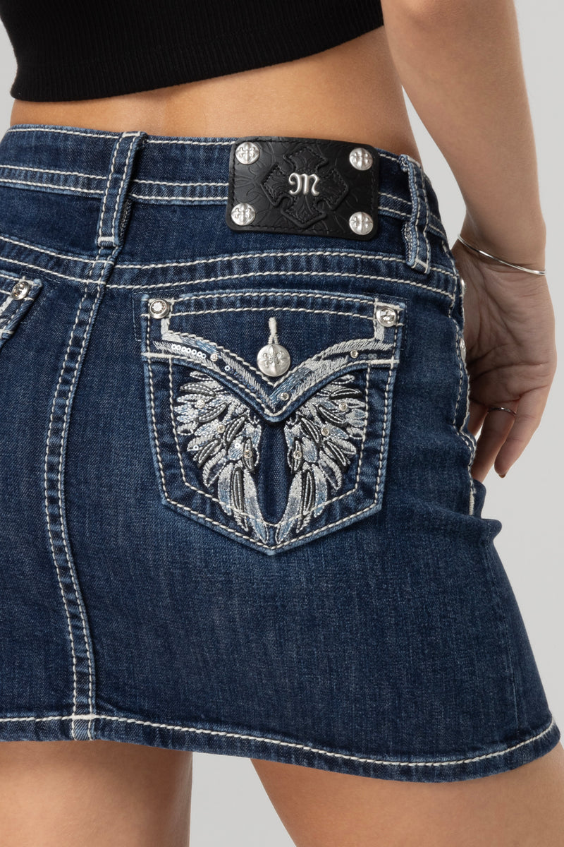 Fallen Wings Mini Skirt | Only $59.40 | Med/Dark Wash | Miss Me