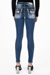 Cow Print Cross Skinny Jeans