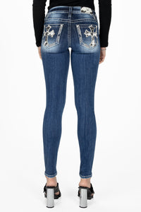 Cow Print Cross Skinny Jeans