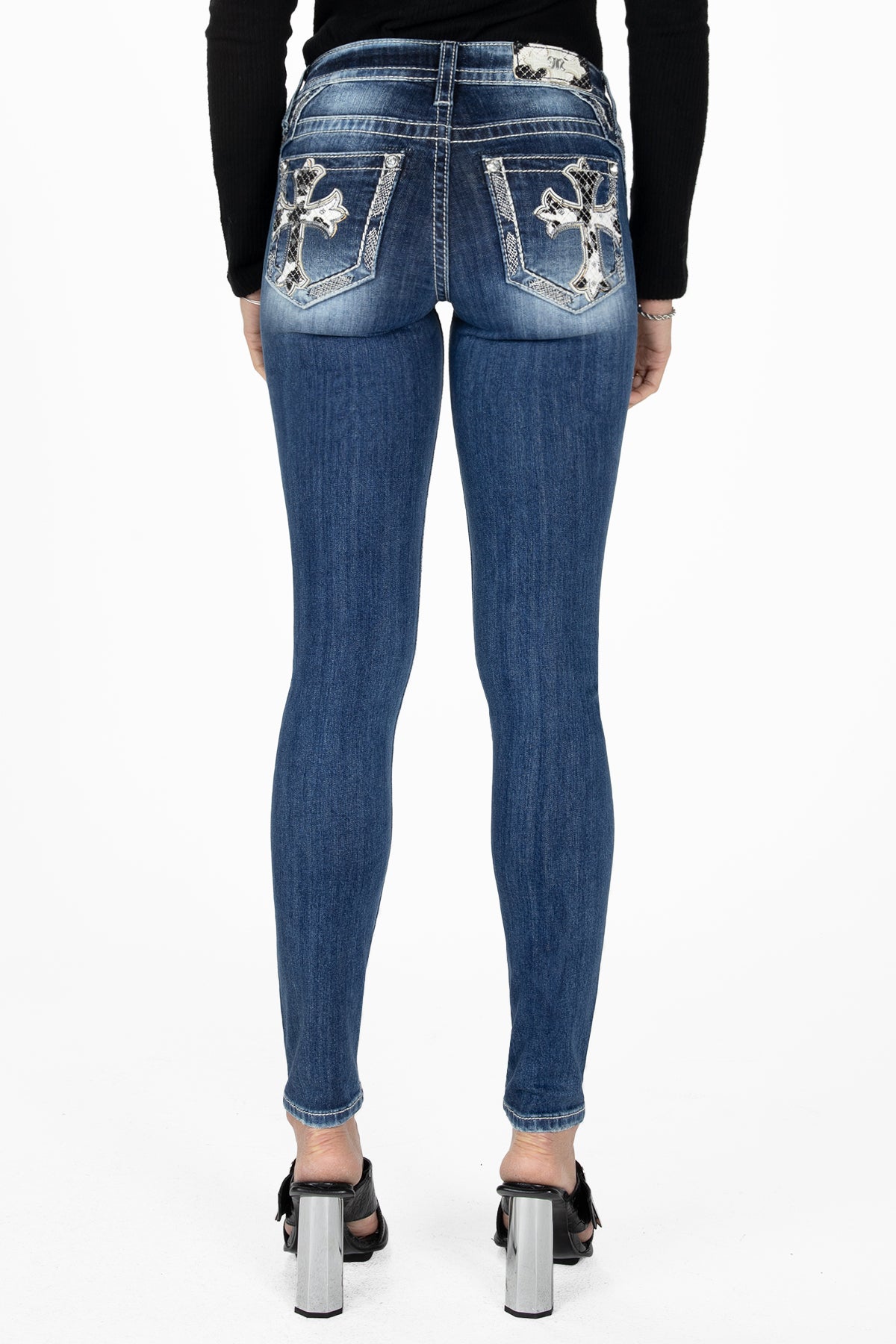 Cow Print Cross Skinny Jeans