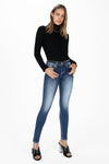 Cow Print Cross Skinny Jeans