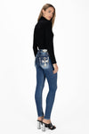 Cow Print Cross Skinny Jeans