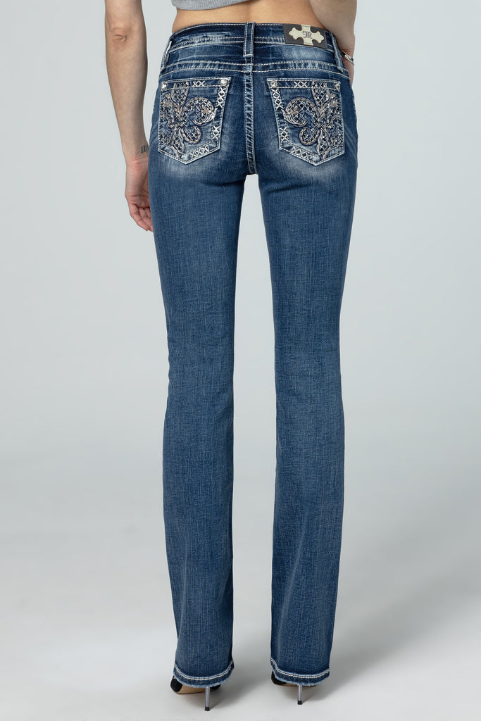 model wearing fleur glass bootcut jeans