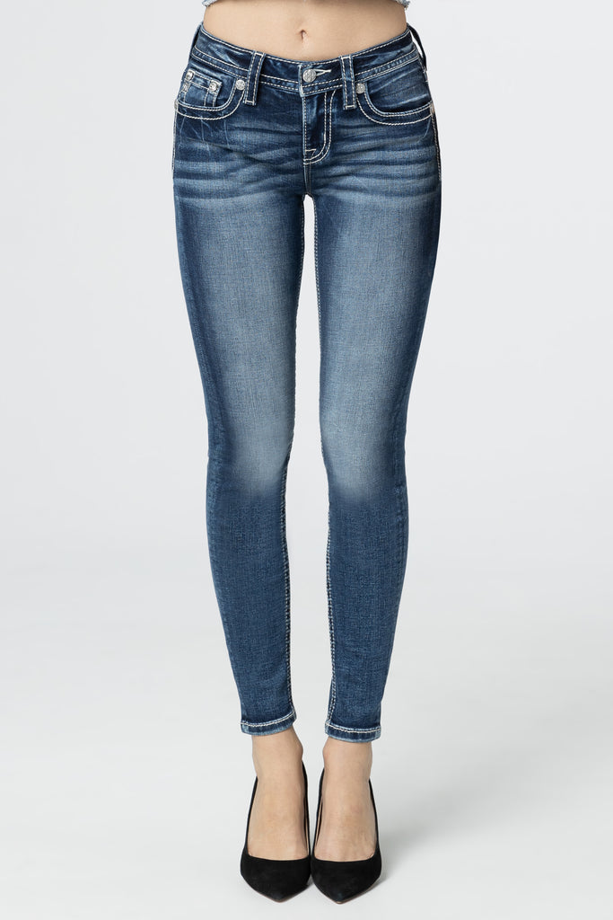 feather torn wing skinny jeans